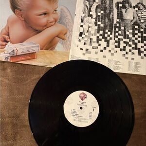 Warner Bros. Black Vinyl Record with White Center Label 1984 collectable vintage